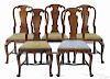 Five George II mahogany dining chairs