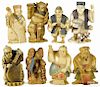 Eight Japanese Meiji period carved ivory figural