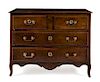 A Louis XV Provincial Walnut Commode Height 35 1/2 x width 47 1/2 x depth 22 inches.
