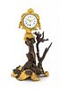 A French Gilt and Patinated Bronze Figural Clock Height 11 1/8 inches.