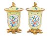 * A Pair of French Gilt Bronze Mounted Porcelain Covered Jars Height 8 inches.