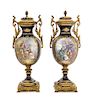 * A Pair of Sevres Style Porcelain Urns Height 12 3/4 inches.