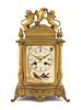 A French Gilt Bronze Mantel Clock Height 14 inches.