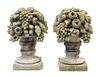 * A Pair of Cast Stone Garden Models of Fruit-Filled Urns Height 21 1/2 inches.