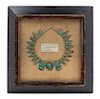 A Framed Egyptian Faience Bead Necklace Width overall 12 1/2 inches.