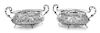 * A Pair of German Silver Bonbon Dishes, , the openwork border and body worked to show rocaille, floral and foliate motifs.