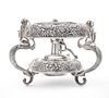 * A Japanese Silver Water Kettle Stand, Y. Konoike, Yokohama, Meiji Period, the kettle stand worked to show repousse chrysant
