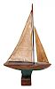 A Painted Model of a Sailboat Height 23 1/2 width 13 1/2 inches.
