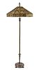 * An American Pierced Brass Floor Lamp Height 67 x diameter of shade 26 inches.