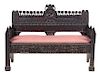 A Gothic Revival Oak Bench Width 59 1/2 inches.