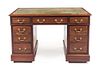 A George III Style Mahogany Pedestal Desk Height 30 x width 48 x depth 26 1/4 inches.