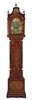 * A George III Mahogany and Marquetry Tall Case Clock Height 97 7/8 inches.