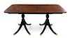 A Regency Style Mahogany Dining Table Height 29 x width 66 x depth 41 inches.