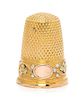 * A French Tri-Colored Gold Thimble, , the knurled top and body above a rose, white and yellow gold band worked to show folia