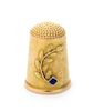 * A Russian Yellow Gold and Sapphire Thimble, Maker's Mark Obscured, St. Petersburg, the domed knurled top above the plain bo