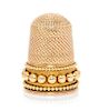* A George III Style Yellow Gold Thimble, , the knurled top and body above three beaded bands.
