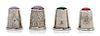 * Four Silver and Glass Thimbles, , comprising an English example having an amethyst inset top above the body with floral dec