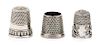 * Three American Silver Thimbles, Various Makers, comprising an example with a rim worked to show putti masks, Goldsmith Stea