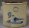 Stoneware crock N. Caire Jr. Athens, N.Y. with cobalt blue bird and flower (small rim repair).  ht. 9in., dia. 10 1/4in. Prov