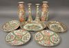 Nine piece lot of Rose Famille porcelain to include a pair of vases, pair of candlesticks, three small oval serving dishes, a