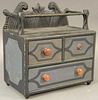 Miniature chest with carved back and rail with two small drawers over one drawer set on small feet, in old paint (one knob as