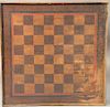 Primitive game board with molded edge.  18 1/2" x 18 1/4"  Provenance:  Estate of Arthur C. Pinto, MD