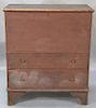 Primitive blanket chest with lift top over two drawers set on cut out bracket base in old brown paint.  ht. 46in., wd. 38in. 