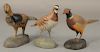 Three Albert J. Ditman (1884-1974) hand carved and painted miniature bird decoys on chip carved bases to include "Quail" sign