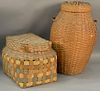 Two large splint Indian baskets, each with covers, one with paint decoration.  ht. 15in., 16" x 22"  ht. 27in. Provenance:  .