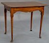Mahogany Queen Anne tea table, shaped top with applied molded edge on base with scalloped skirt, on turned legs and pad feet,