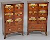 Pair of small mahogany spice chests, each with six small drawers over one long drawer set on flared French feet, drawers with