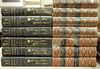 Twenty leatherbound books including a set of Thackeray's Works (13 volumes, and a set of Prosper Merimee Writing (7 volumes).