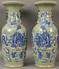 Pair of large Chinese celadon and blue palace vases having flared rim, molded foo dog handles, and molded scholar figures.  h