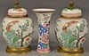Three Chinese porcelain pieces to include a pair of Chinese Famille Rose porcelain ginger jars having bronze foot, neck ring,