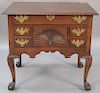 Chippendale mahogany lowboy having rectangular top over one long drawer over central shell carved deep drawer flanked by two 