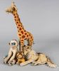 Four Steiff plush animals, to include a giraffe, 30 1/2'' h., a monkey, a dog, and a lion.