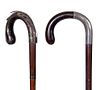 75. A Pair of Silver Crook Canes- One is fine, the other has some damage. A.L.- 36” $150-200