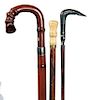 105. Three Piece Lot of Canes- One horn sword cane, one umbrella cane and one bone handle cane. A.L.- 35” $400-500