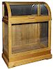 141. Oak Cane Case- Ca. 1900- A fine example in near mint condition, with 78 stick and ball dividers, stepped five tier base,