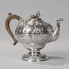 Samuel Kirk .917 Silver Teapot, Baltimore, c. 1840, the pear-shaped body with allover repousse chased chinoiserie landscape c