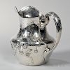 Gorham Sterling Silver Pitcher, Providence, 1915, with cherry blossoms extending from handle across hammered body, ht. 8 5/8 