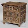 Spanish Colonial-style Carved Oak Chest, 19th century, top projection over paneled case with two drawers decorated with chip-