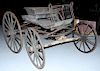 War Between the States era buckboard buggy with fancy ironwork, front spring has Ram's horn handmade finial, original seat, b