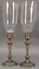 Pair of Sheffield candlesticks with hurricane etched glass shades. ht. 23in.