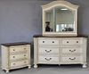 Hooker four piece bedroom set with queen bed (ht. 56in.), chest (ht. 82in., wd. 66in.), mirror, and night table.
