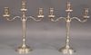 Pair of silver three light candelabras, marked 800. ht. 14in., wd. 12in., 33.51 t oz.