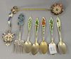 Group of eight enameled spoons and forks, sterling silver fork, set of five spoons, and two spoons. 4.19 t oz.