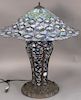 Tiffany style leaded table lamp with lighted base, late 20th century. ht. 30in., dia. 27in.