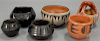Group of six pottery pieces including Alvina Garcia bowl, Orlinda bowl, small basket, Blackware small bowl, Angelita Blackwar