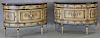 Ferguson Copeland Ltd. pair of paint decorated demilune commodes, each with brown marble tops. ht. 34in., wd. 52in., dp. 18in
